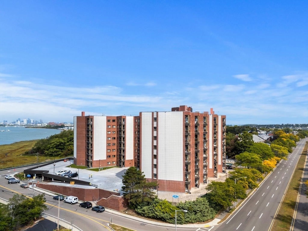 a view of a large building with an ocean view