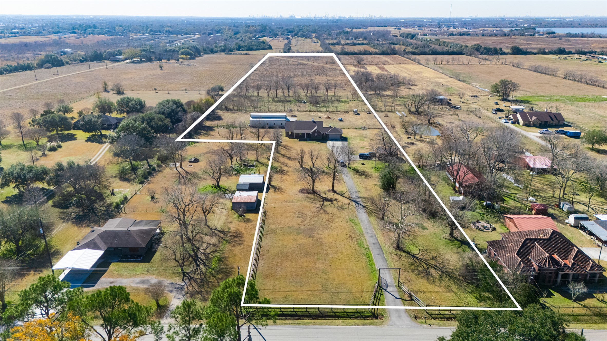 3418 Barbers Hill Road Highlands, TX 77562 - Photo 48 of 50 an aerial view of residential houses with outdoor space