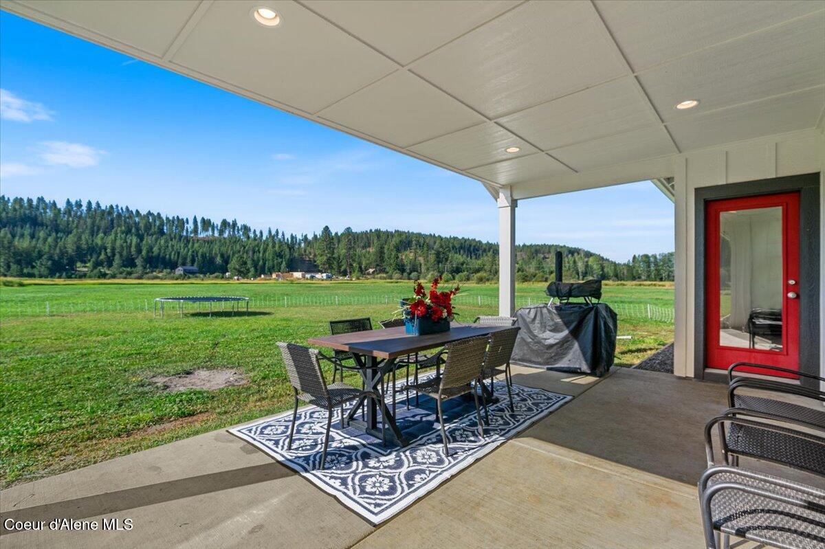 1974 Kelso Lake Road Athol, ID 83801 - Photo 36 of 55 41-Back patio and views