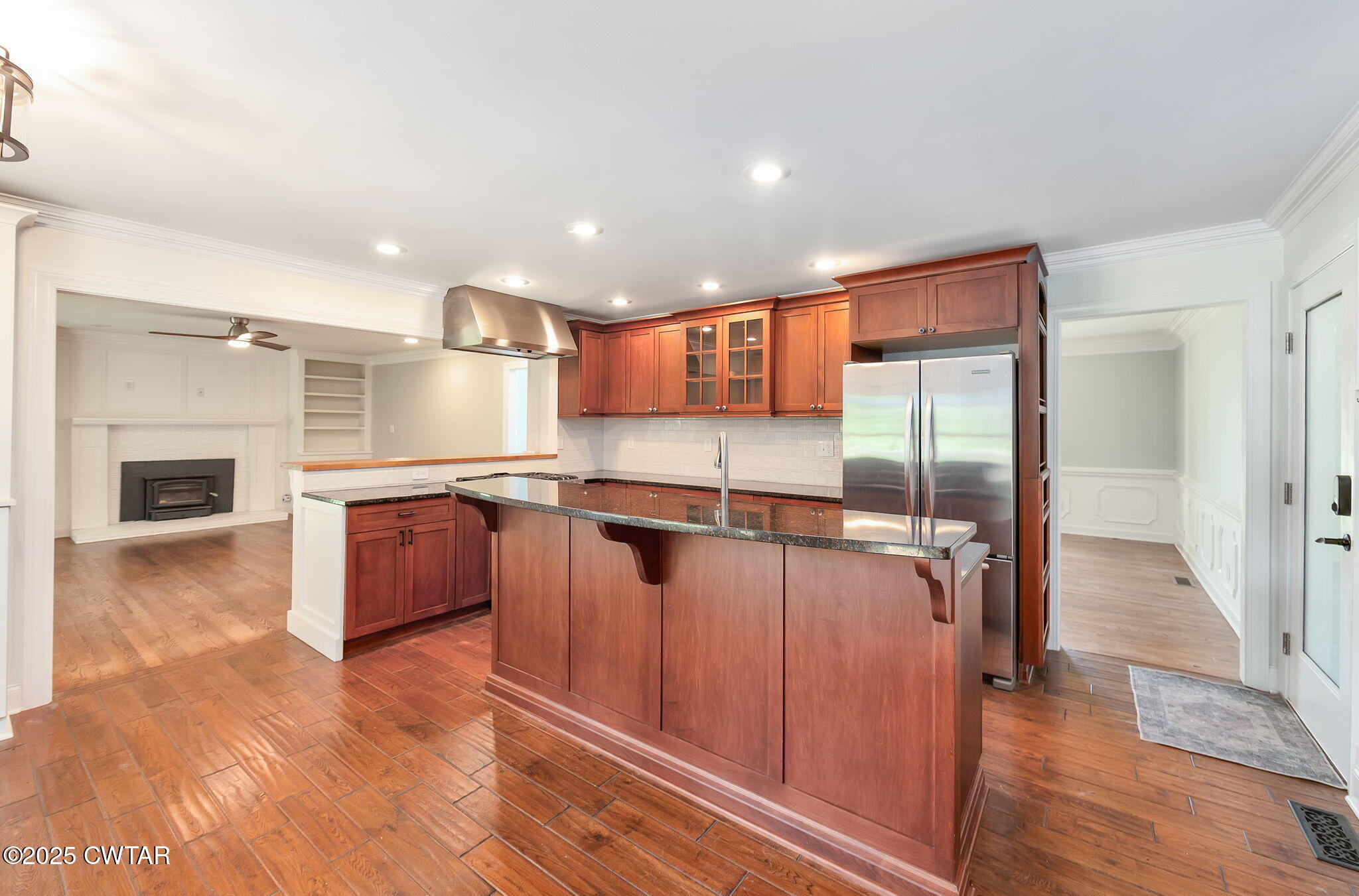465 Shadow Ridge Drive Jackson, TN 38305 - Photo 11 of 44 a view of a kitchen with a sink and a refrigerator