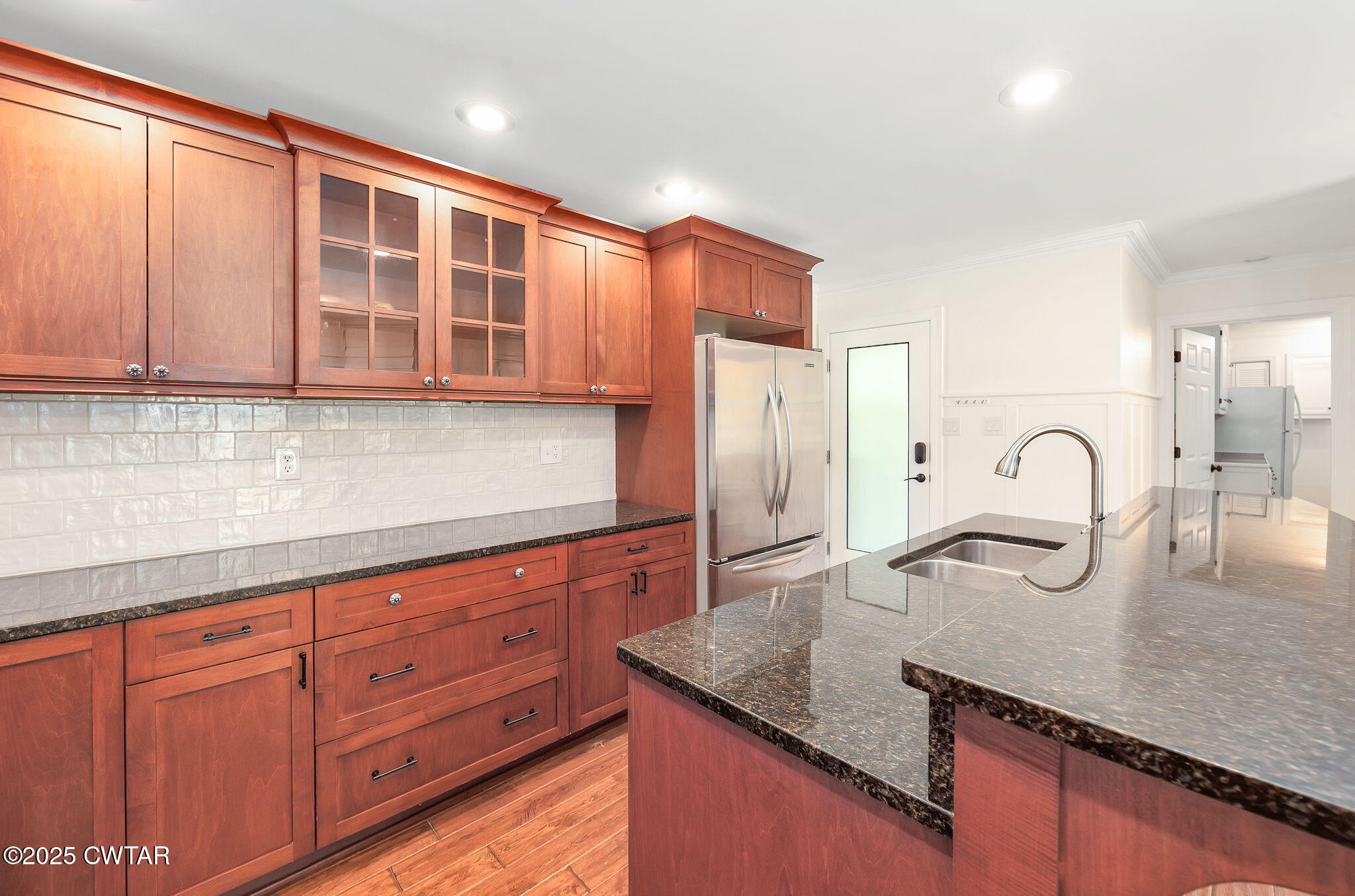 465 Shadow Ridge Drive Jackson, TN 38305 - Photo 13 of 44 a kitchen with cabinets appliances and a counter space