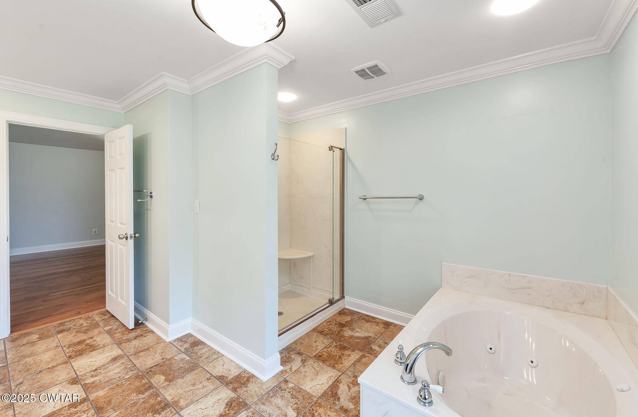 465 Shadow Ridge Drive Jackson, TN 38305 - Photo 29 of 44 a bathroom with a sink and a shower