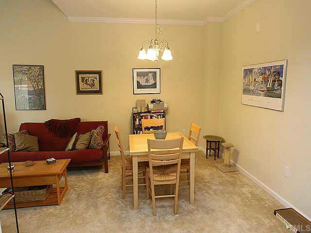 2652 Arbor Crest Road Raleigh, NC 27604 - Photo 3 of 7 a view of a dining room with furniture