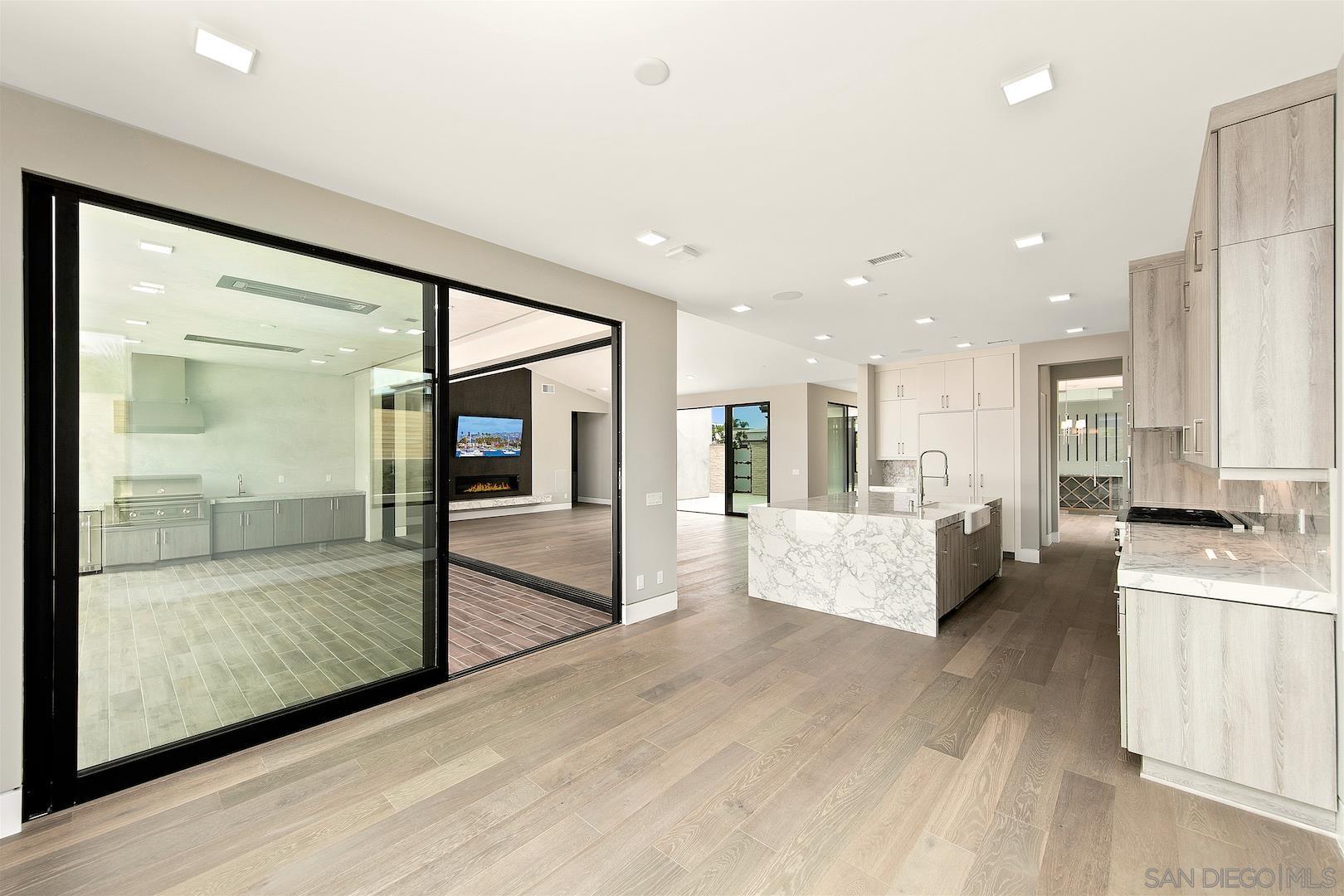 1817 Gwynn Drive Cardiff, CA 92007 - Photo 11 of 50 a large living room with a large mirror