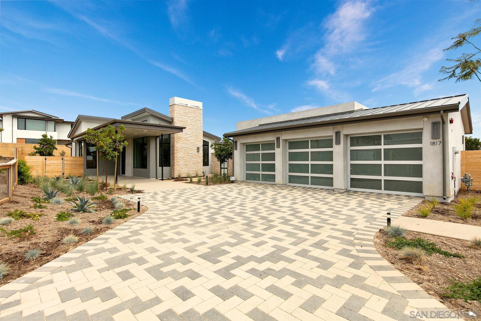 1817 Gwynn Drive Cardiff, CA 92007 - Photo 2 of 50 a front view of a house with a yard