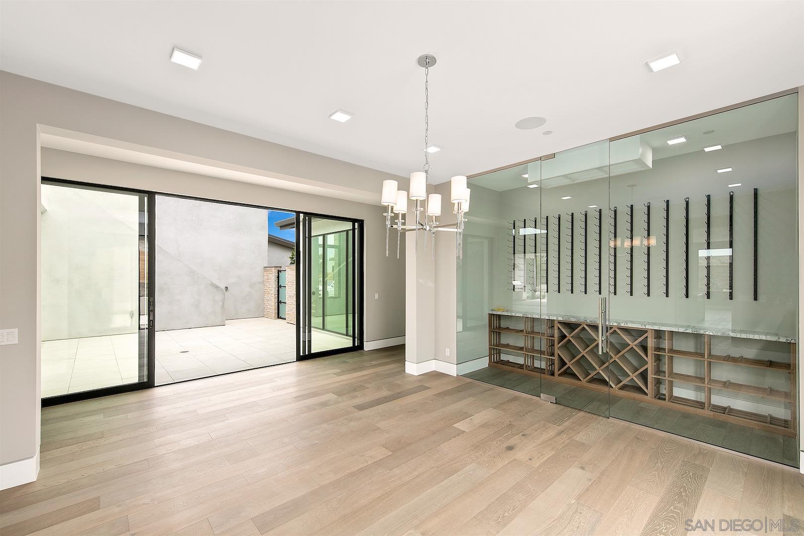 1817 Gwynn Drive Cardiff, CA 92007 - Photo 24 of 50 a view of an entryway with wooden floor