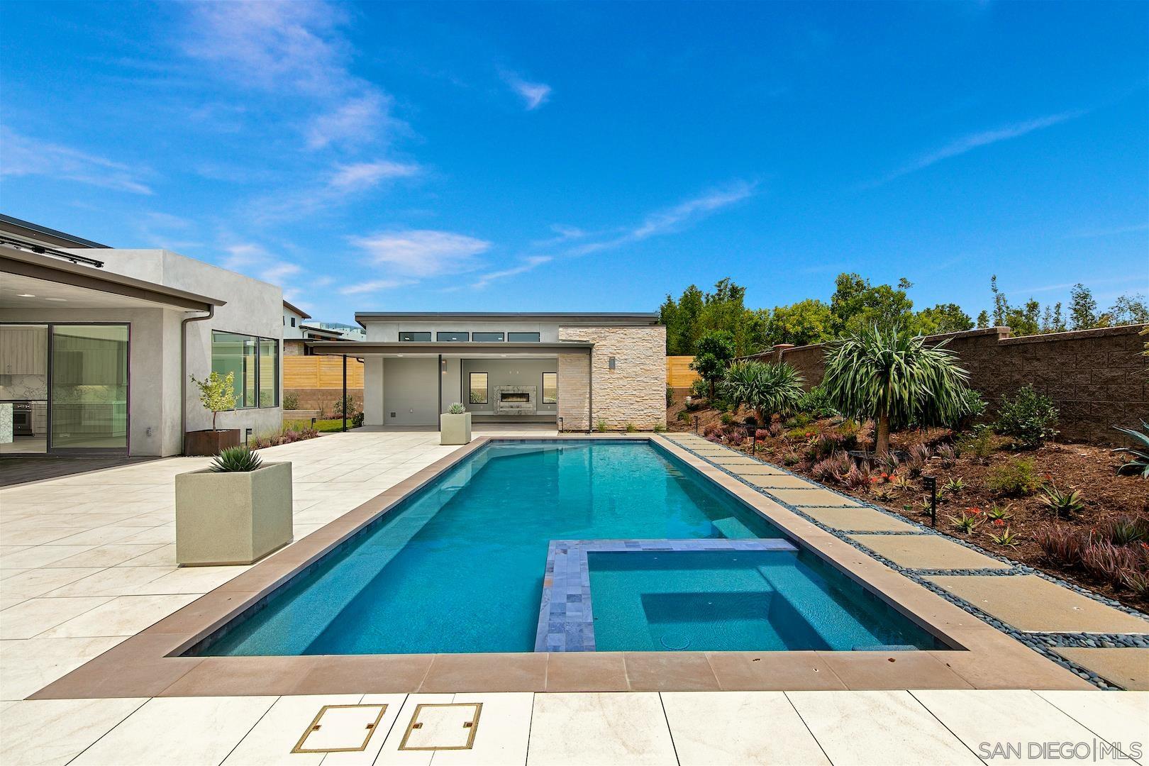 1817 Gwynn Drive Cardiff, CA 92007 - Photo 3 of 50 a swimming pool with outdoor seating and yard