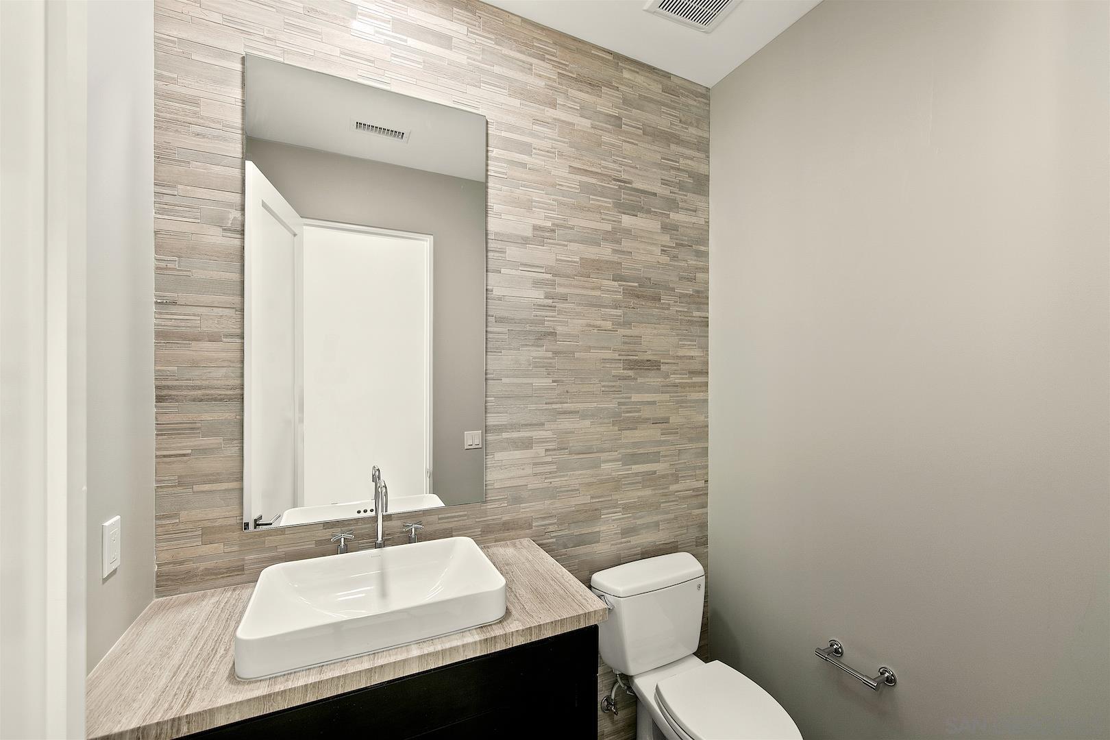 1817 Gwynn Drive Cardiff, CA 92007 - Photo 43 of 50 a bathroom with a sink and a toilet