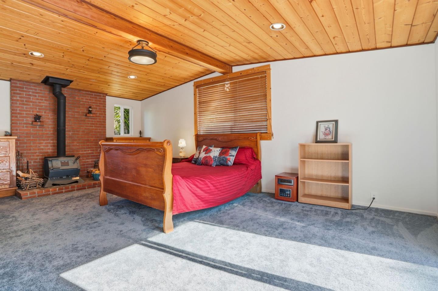 2594 San Juan Road Aromas, CA 95004 - Photo 11 of 34 a bed room with a bed and furniture