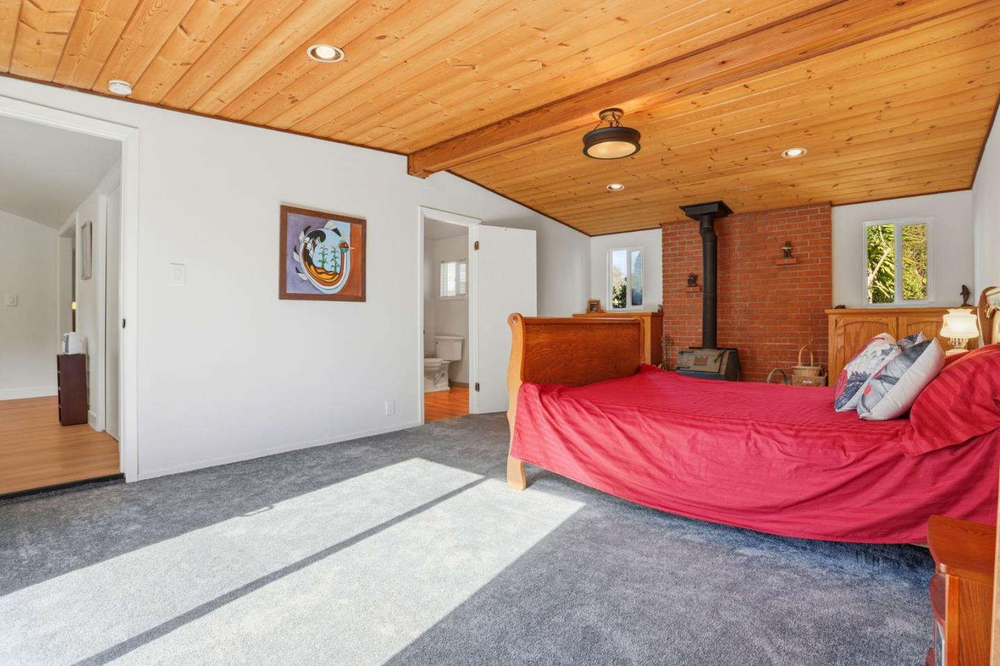 2594 San Juan Road Aromas, CA 95004 - Photo 12 of 34 a spacious bedroom with a bed and a walk in closet