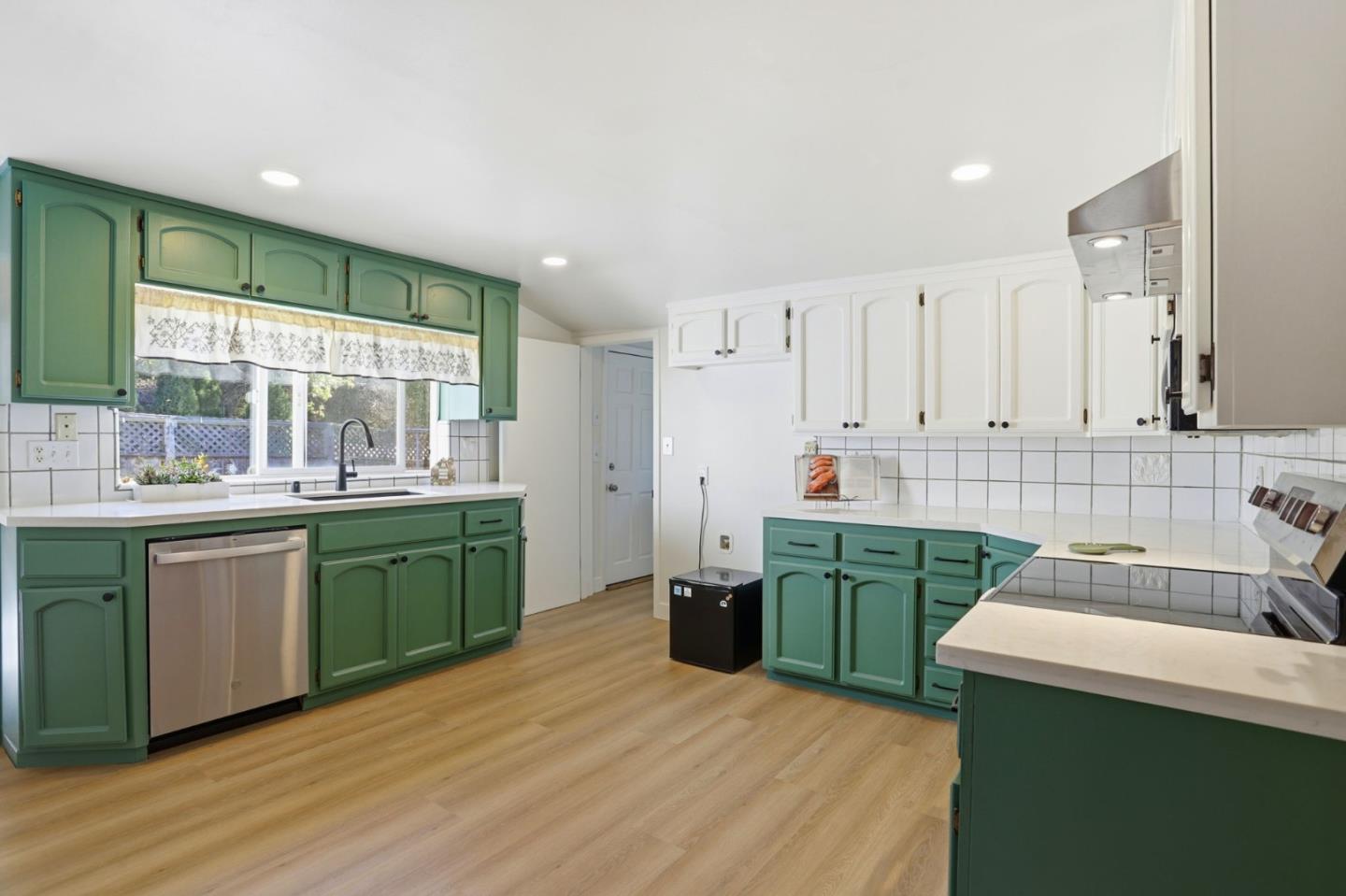 2594 San Juan Road Aromas, CA 95004 - Photo 7 of 34 a kitchen with a sink cabinets and wooden floor