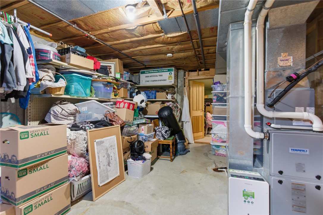 8747 Waynes Way Blanchester, OH 45107 - Photo 26 of 40 This versatile basement offers ample storage and potential for future customization.
