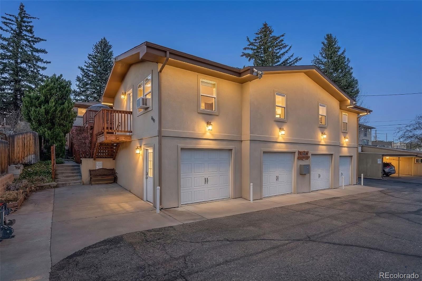 a front view of a house with a garage