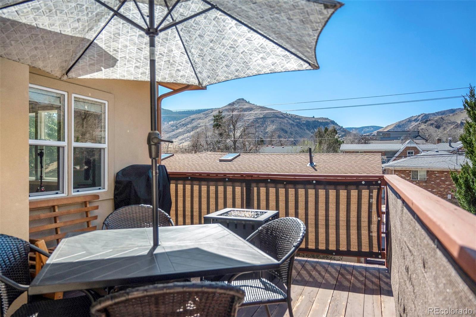 809 5th Street, Unit 201 Golden, CO 80403 - Photo 19 of 32 a view of a balcony with furniture