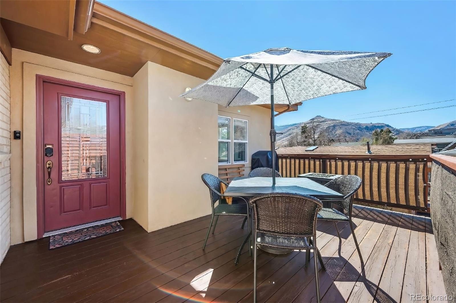 809 5th Street, Unit 201 Golden, CO 80403 - Photo 3 of 32 a patio with a table and chairs