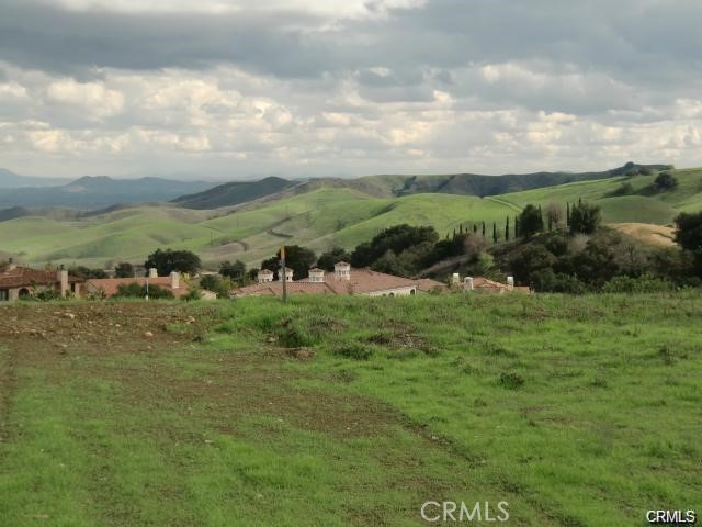 2572 Collinas Point Chino Hills, CA 91709 - Photo 16 of 28 a view of a lake with mountains in the background