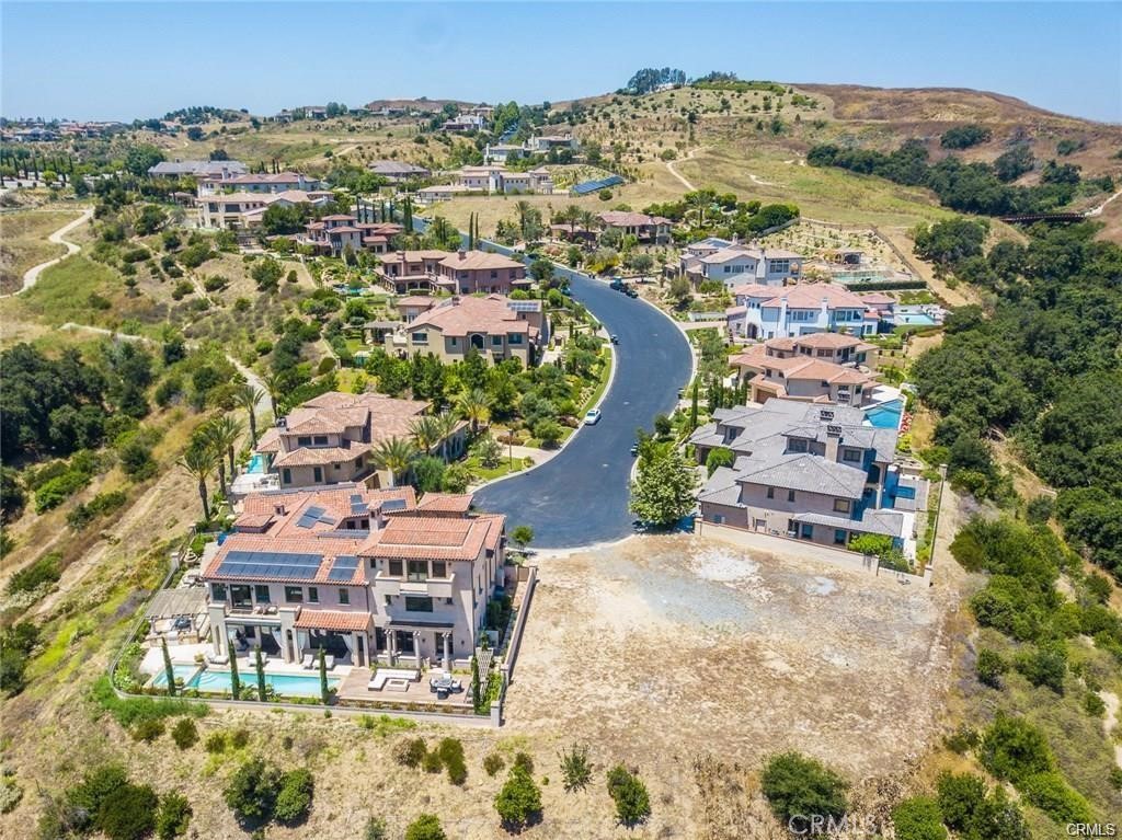 2572 Collinas Point Chino Hills, CA 91709 - Photo 24 of 28 an aerial view of residential houses with outdoor space and trees