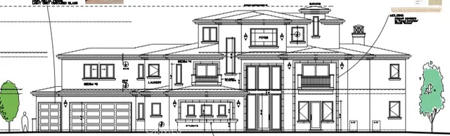 a view of a balcony with two chairs and a table