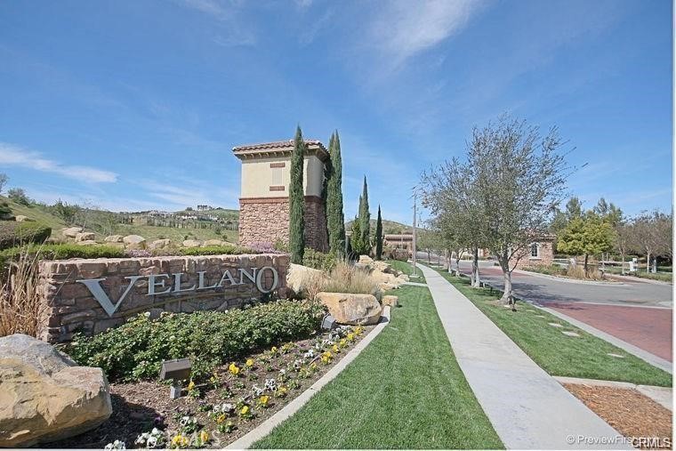 2572 Collinas Point Chino Hills, CA 91709 - Photo 6 of 28 a view of a pathway with a wrought fence