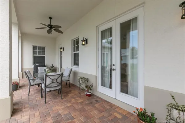 a view of a livingroom with furniture and a window