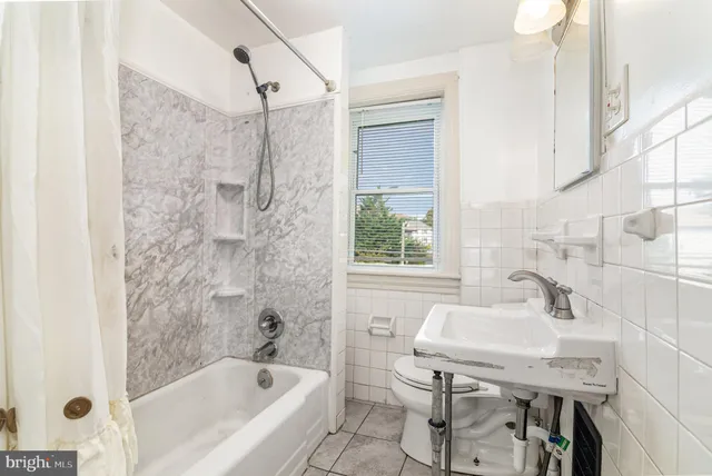 a bathroom with a sink and a bathtub