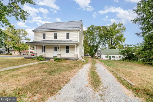 a view of a house with a swimming pool