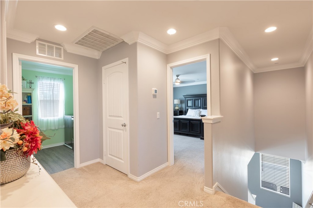 30283 Ramsay Drive Menifee, CA 92584 - Photo 16 of 24 a view of a hallway and dining room