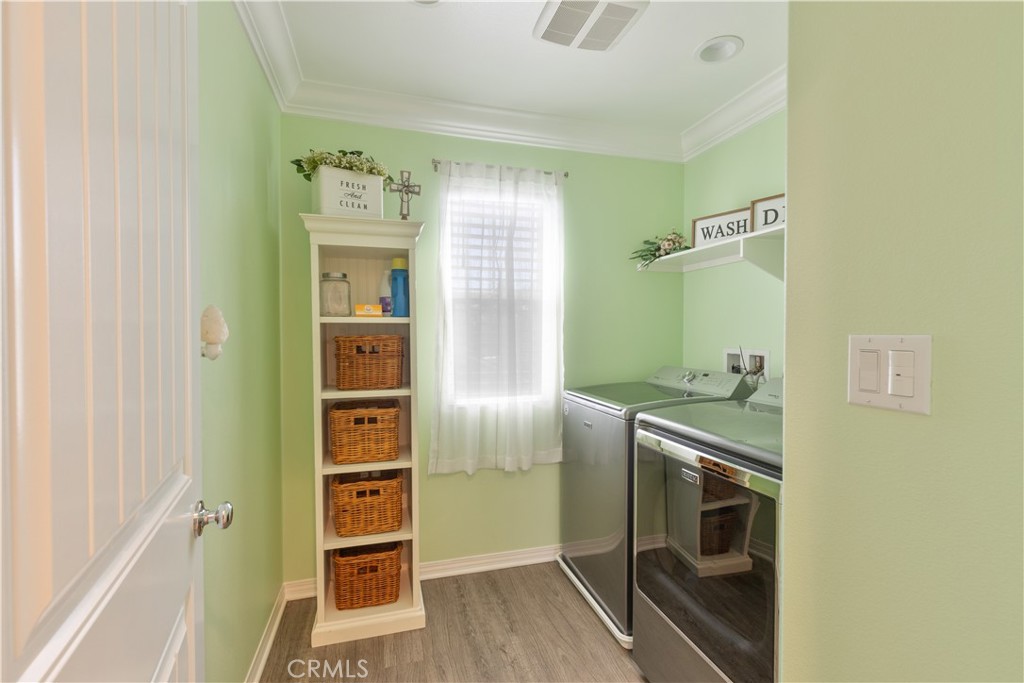 30283 Ramsay Drive Menifee, CA 92584 - Photo 17 of 24 a bathroom with a sink a toilet and shower