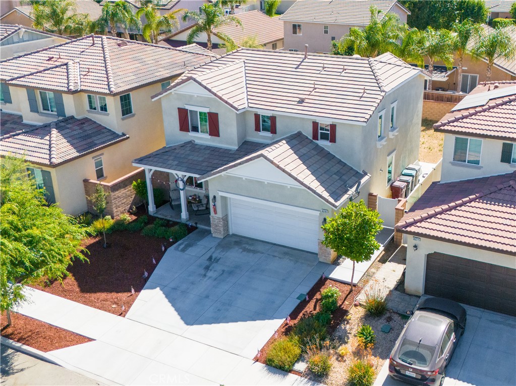 30283 Ramsay Drive Menifee, CA 92584 - Photo 24 of 24 a aerial view of a house with a yard and potted plants