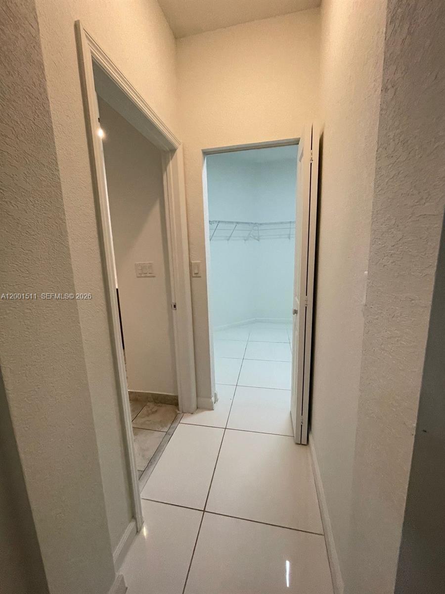4451 Southwest 159th Path Miami, FL 33185 - Photo 9 of 24 a view of an empty room