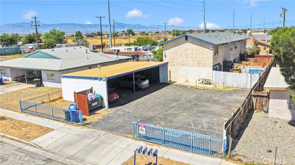 18130 Casaba Road Adelanto, CA 92301 - Photo 4 of 13 a view of a swimming pool with a patio