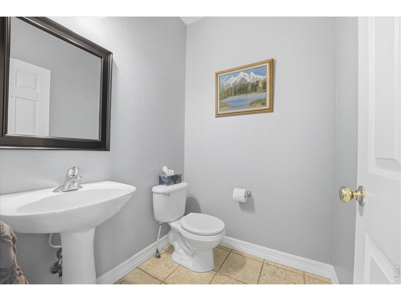 651 Americana Road Longmont, CO 80504 - Photo 24 of 50 Main level powder room