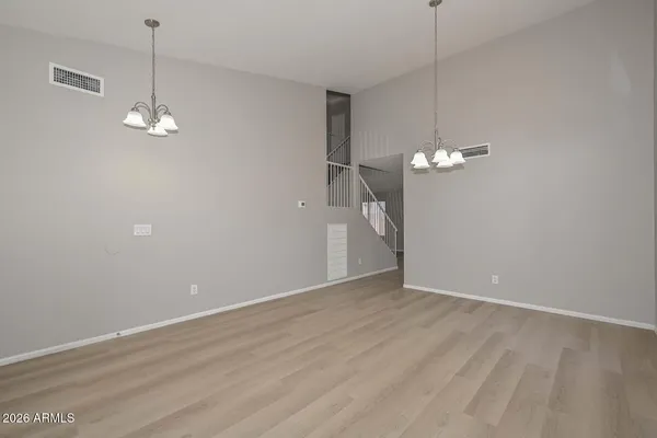 a view of livingroom with window hardwood floor