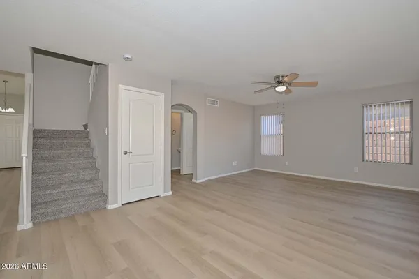 a view of a livingroom with a ceiling fan