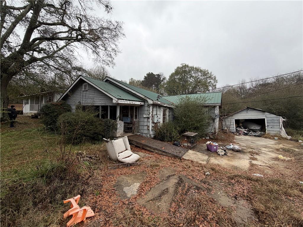 318 Morgan Valley Road Rockmart, GA 30153 - Photo 5 of 8 a view of a house with a yard