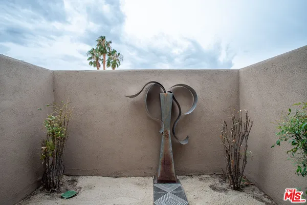 a outdoor dining space with furniture and outdoor view