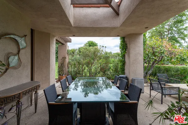 a view of a terrace with furniture