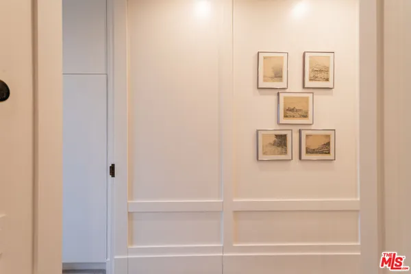 a bathroom with bathtub and mirror