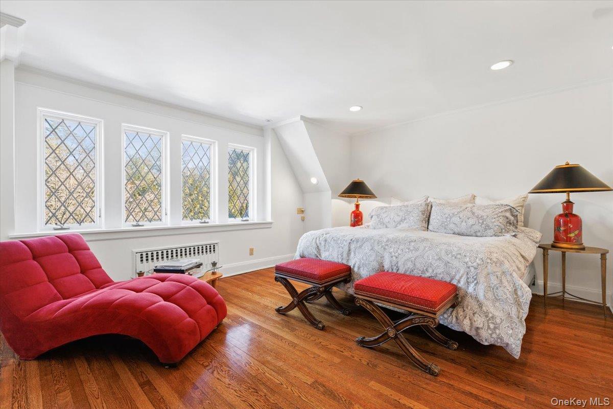 46 Fenimore Road Scarsdale, NY 10583 - Photo 19 of 35 Spacious Primary Bedroom has lovely views through the diamond pane leadlight windows.