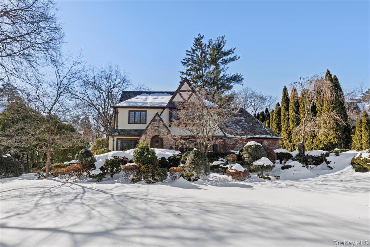 46 Fenimore Road Scarsdale, NY 10583 - Photo 2 of 35 Winter view of this storybook Tudor in a lovely Fox Meadow neighborhood.