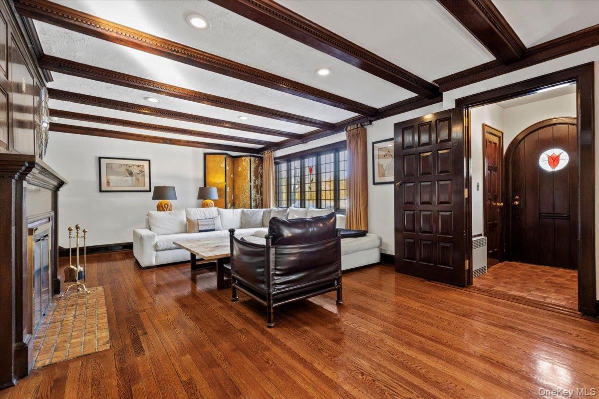 46 Fenimore Road Scarsdale, NY 10583 - Photo 6 of 35 Spacious Living Rm w/gleaming hardwood flooring and beamed ceilings w/dental molding detailing.