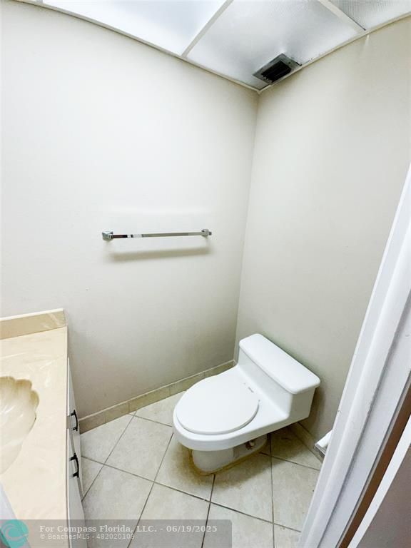 1820 Southwest 81st Avenue, Unit 3201 North Lauderdale, FL 33068 - Photo 11 of 20 a bathroom with a toilet and a sink