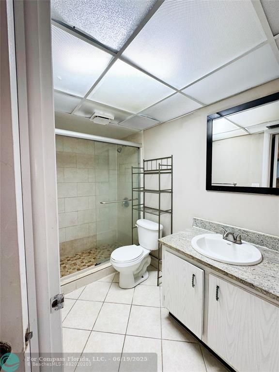 1820 Southwest 81st Avenue, Unit 3201 North Lauderdale, FL 33068 - Photo 17 of 20 a bathroom with a sink toilet and shower