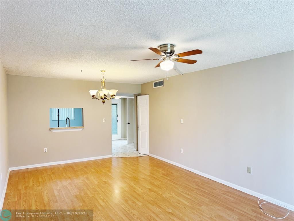 1820 Southwest 81st Avenue, Unit 3201 North Lauderdale, FL 33068 - Photo 6 of 20 a view of a room with a ceiling fan