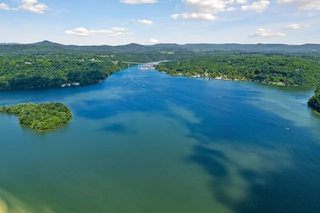 a view of a lake with mountain