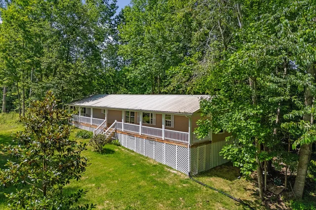 a house view with a garden space