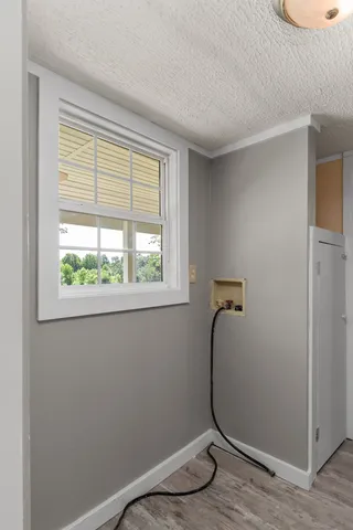 a room with a door and a window