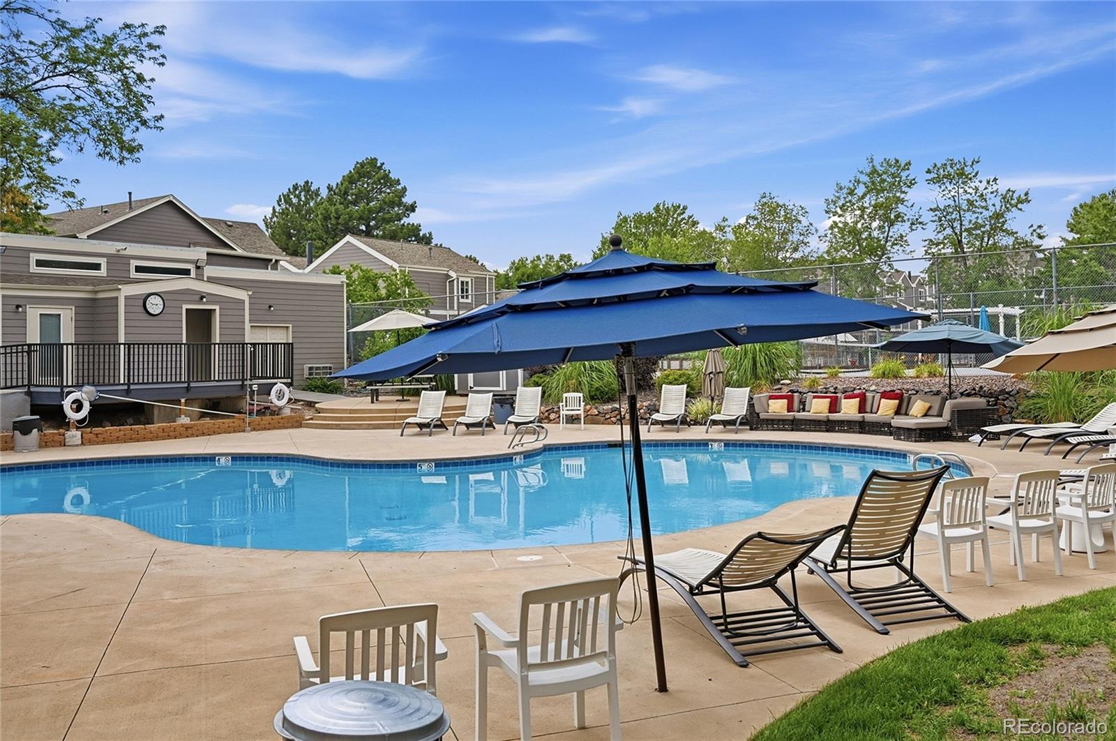 a view of a swimming pool with a patio