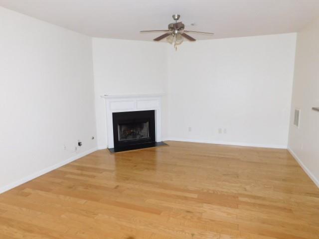 4304 Defoors Farm Trail Powder Springs, GA 30127 - Photo 13 of 41 a view of an empty room with a fireplace