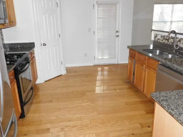 a view of a kitchen from the kitchen